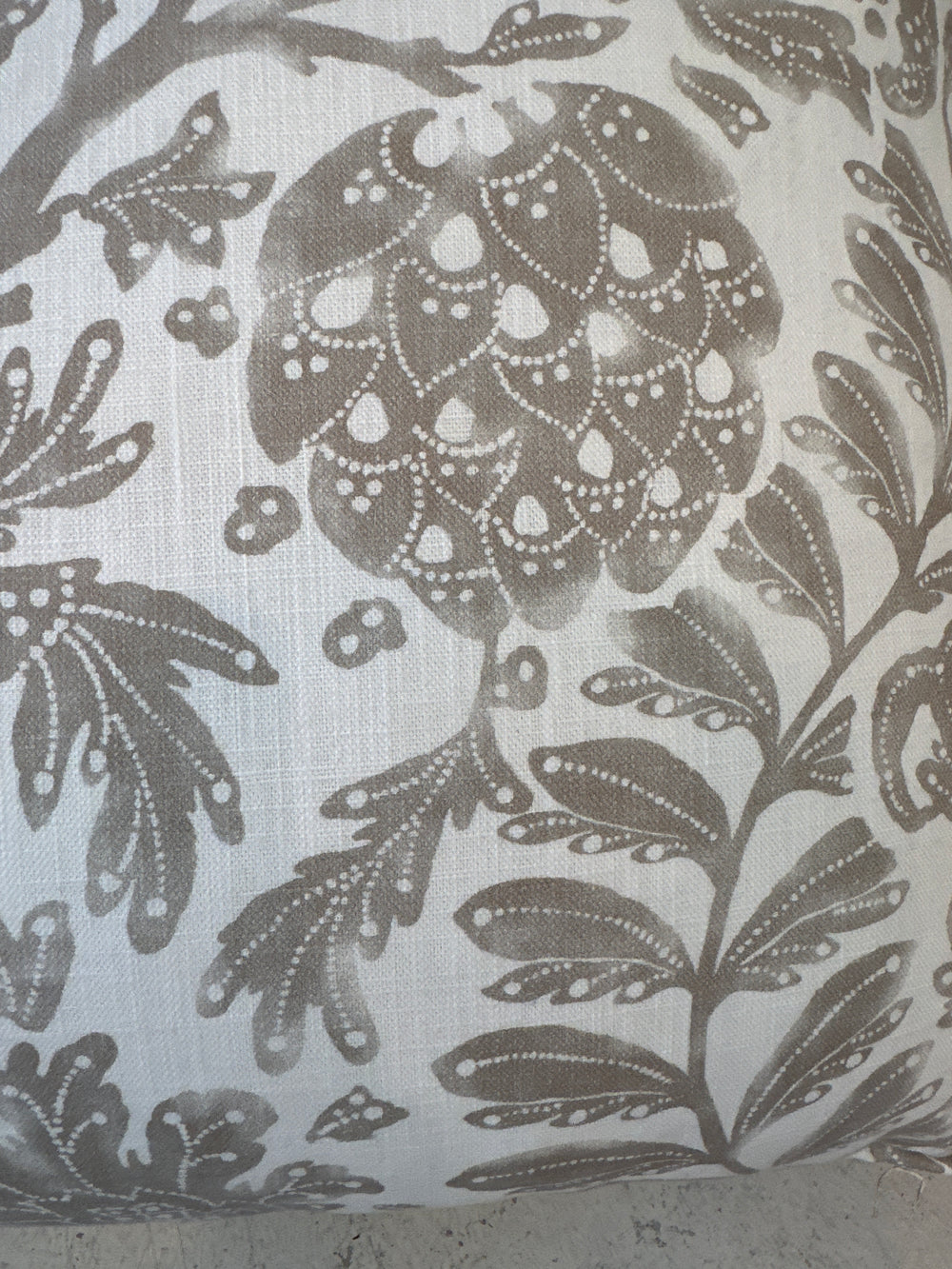Tan and white vine pillow