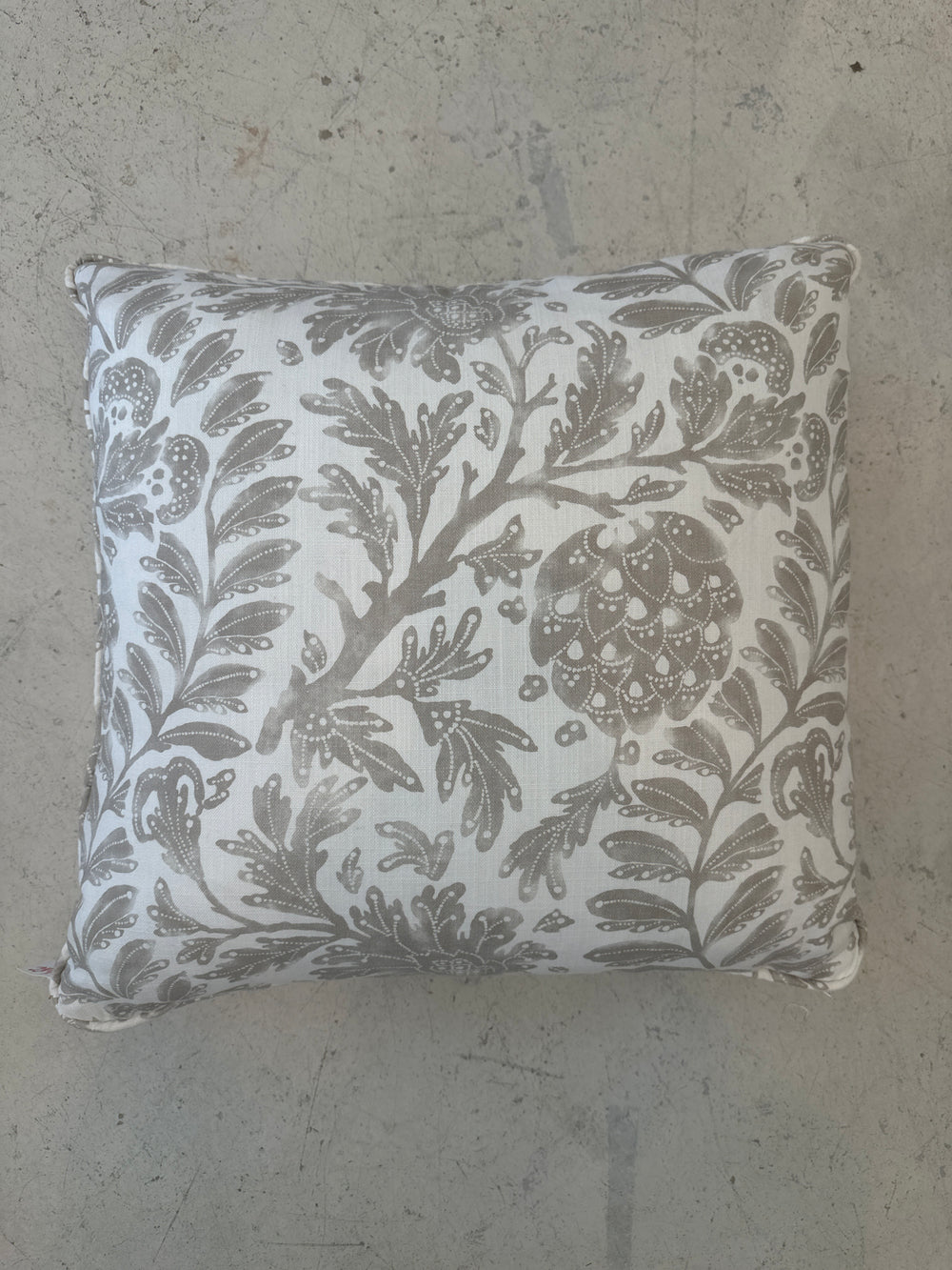 Tan and white vine pillow