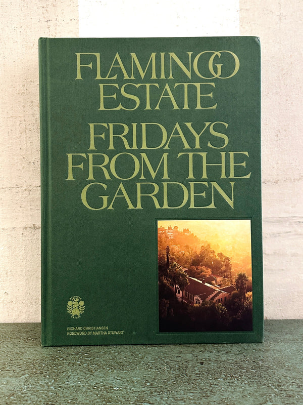 Green book titled 'Fridays from the Garden' by Flamingo Estate on a textured surface with a light background